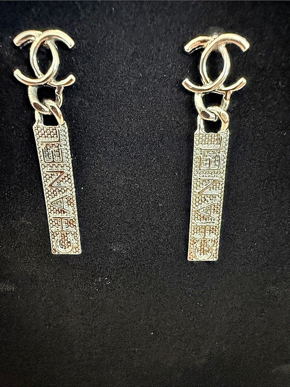 NWOT Logo Drop Earrings in Silver Tone